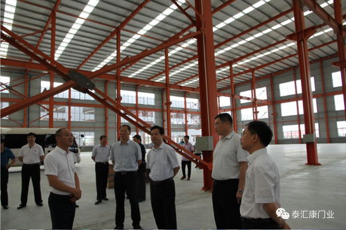 市人大常委會(huì)副主任顧建華到泰匯康門(mén)業(yè)新廠調(diào)研